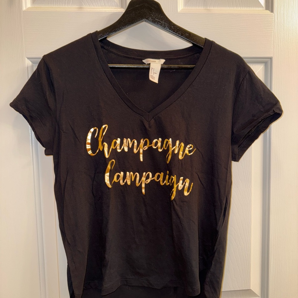 *NWOT* H&M Black V-Neck Tee with Gold Script “Champagne Campaign”